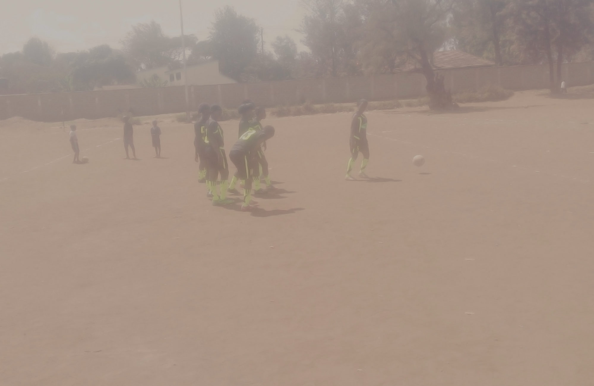 image of girls playing soccer
